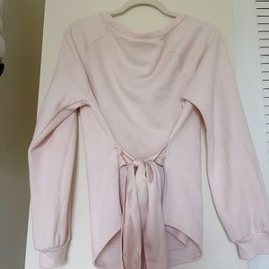 Victoria’s Secret pink off the shoulder sweater with satin lace.